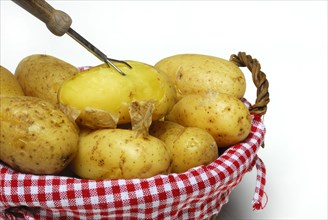 Boiled jacket potatoes in basket