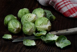 Brussels sprouts with kitchen knife