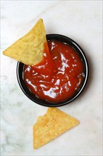 Nachos with tomato dip