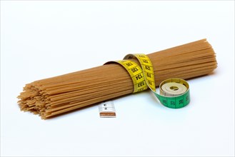 Spaghettis with measuring tape