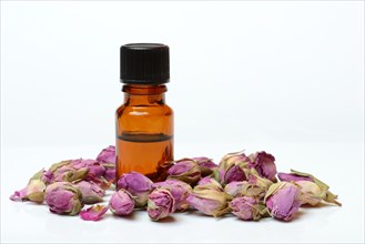 Rose oil and dried rose buds