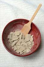 Dried healing clay in bowl