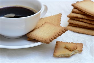 Butter biscuits and cup of coffee
