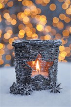Natural outdoor advent decoration with snow