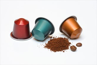 Coffee capsules and ground coffee