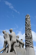 Monolith and human figures
