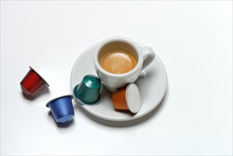 Coffee capsules and coffee cup with espresso