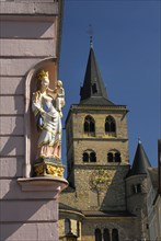 Madonna statue on house facade