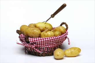 Boiled jacket potatoes in basket