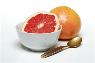 Grapefruit and spoon
