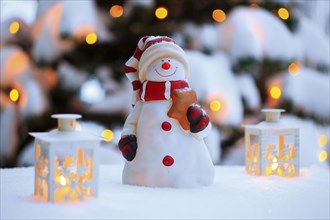 Atmospheric outdoor Christmas decoration with snowman