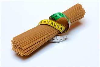 Spaghettis with measuring tape