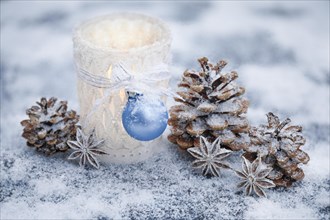 Natural outdoor Advent decoration with ice and snow