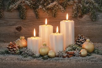 Natural advent decoration with 4 burning candles