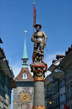 Fountain figure and time bell tower