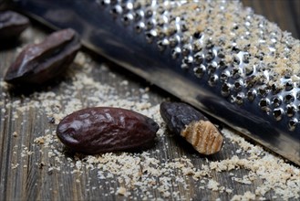 Tonka beans with nutmeg grater
