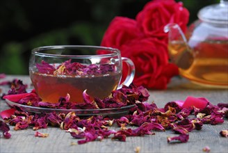 Cup rose tea and dried rose petal tea