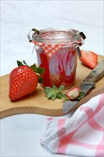 Strawberry jam in glass