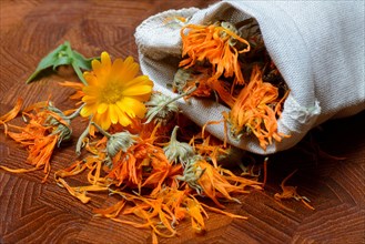 Dried marigold flowers in small bags