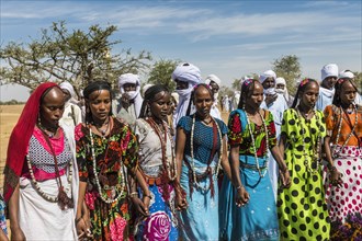 Colourful dressed women at a trribal festival