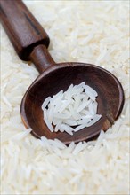 Basmati rice in wooden spoon