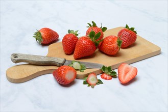 Strawberries on wooden board