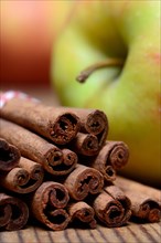 Cinnamon sticks and apple