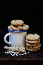 Oatmeal biscuits in cup and oatmeal