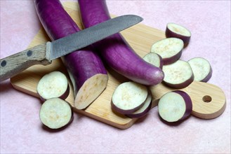 Japanese eggplants with knife