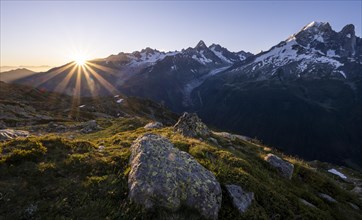 Sun shines over mountains