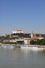 Landing stage for Danube cruise ships with a view to Bratislava Castle