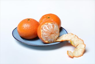 Clementines on plate