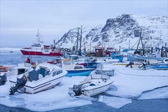 Fishing boats in the ice
