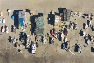 Fishing boats and fishermen cottages at the beach of San Miguel de Cabo de Gata