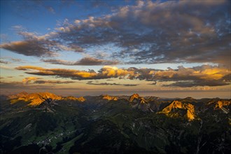 Sunrise with clouds over Allgaeu mountains
