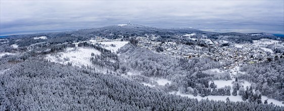 Aerial view over the snow-covered Taunus with Oberreifenberg