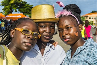 Friendly girls at the Carneval in the town of Sao Tome