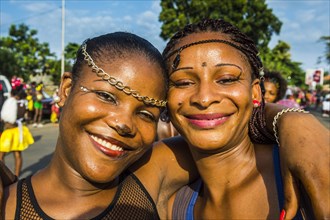 Girls posing at the Carneval in the town of Sao Tome
