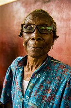 Old market woman in the central Market in the city of Sao Tome