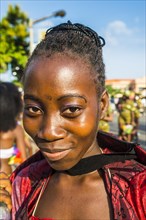 Girl posing at the Carneval in the town of Sao Tome