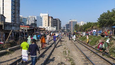Street vendors on the railway tracks going through Kawran Bazar