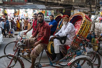 Completely with rickshaws overcrowded street in the center of Dhaka