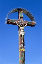 Typical colourful wooden cross at the cemetery