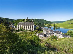 Winegrowing village Beilstein at the river Moselle with Carmelite church and castle ruin Metternich surrounded by vineyards
