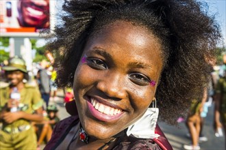 Girl posing at the Carneval in the town of Sao Tome