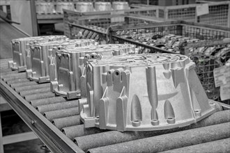 Car parts on a conveyor belt in a car parts factory