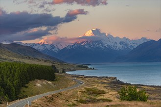 View of Mount Cook with road and lake