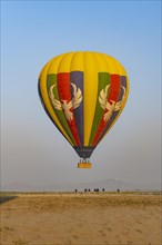 Landing of hot air balloon in the dry bed of the Irrawaddy river