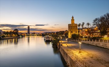 View over the river Rio Guadalquivir with Torre del Oro