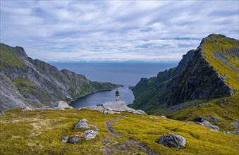 Hiker looks out over the Djupfjords